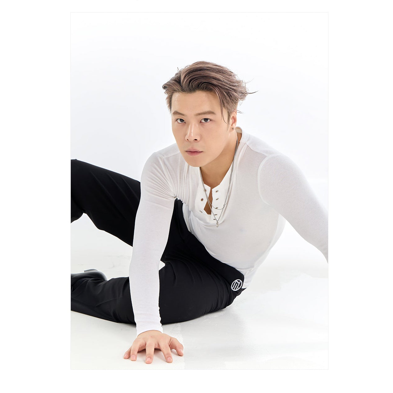 Person in a white long-sleeve shirt and black pants on a white background with 'DUYQ DESIGN' branding.