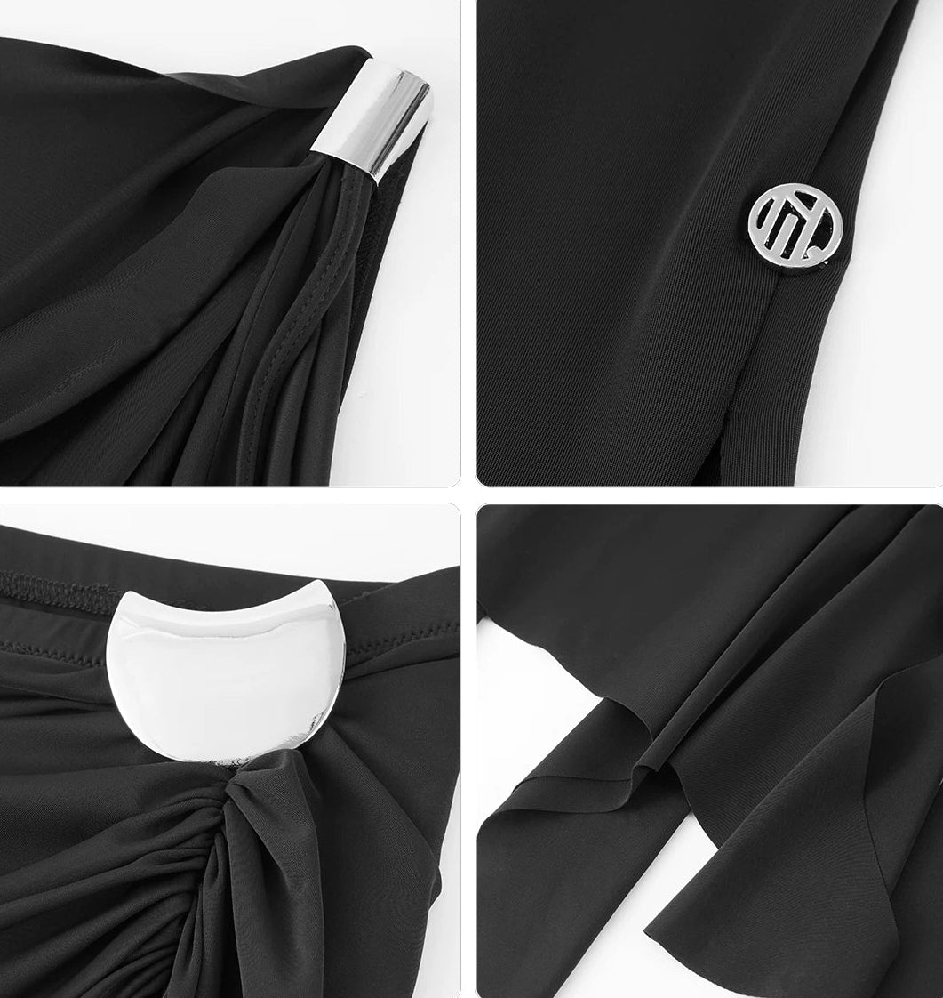 Black garment with white accents and a button detail on a white background