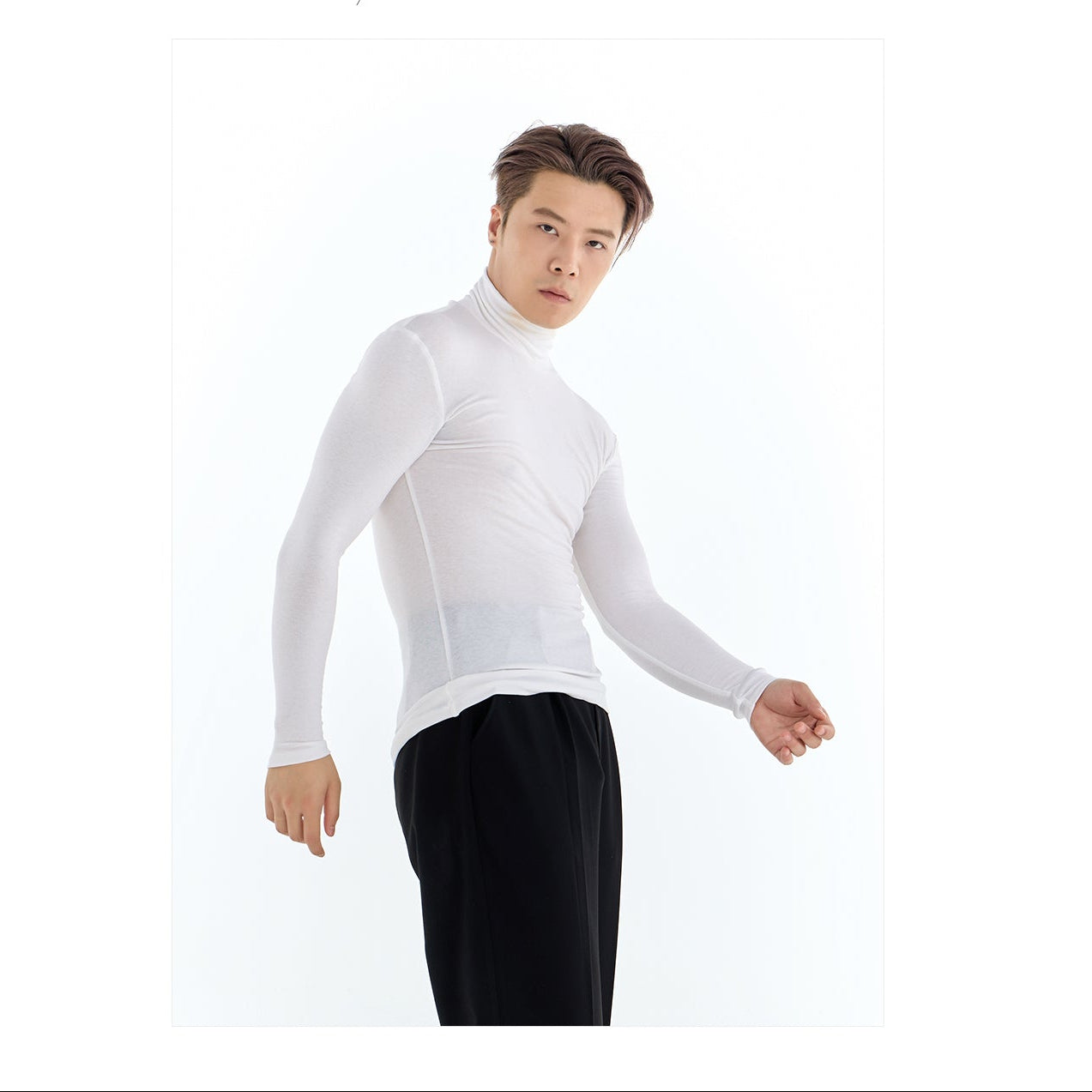 Person wearing a white long-sleeve shirt and black pants on a white background with 'DUNYODESIGN' branding.