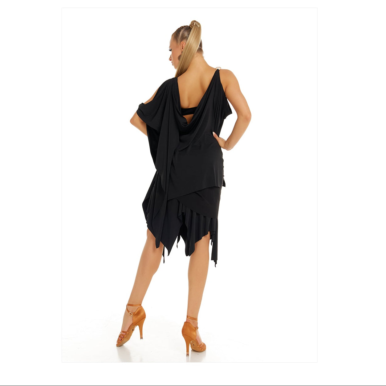 Woman wearing a black dress with a brand logo at the top