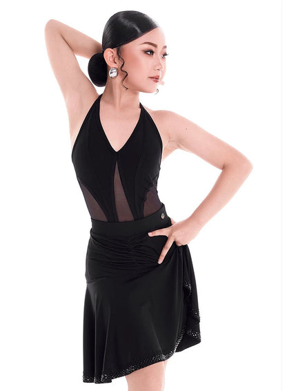 A woman modeling a black Latin dance dress with sheer mesh panels and a flared skirt, posed against a white background with the brand name 'DUYODESIGN' printed above.