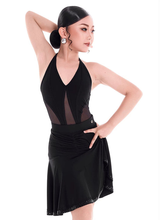 A woman modeling a black Latin dance dress with sheer mesh panels and a flared skirt, posed against a white background with the brand name 'DUYODESIGN' printed above.