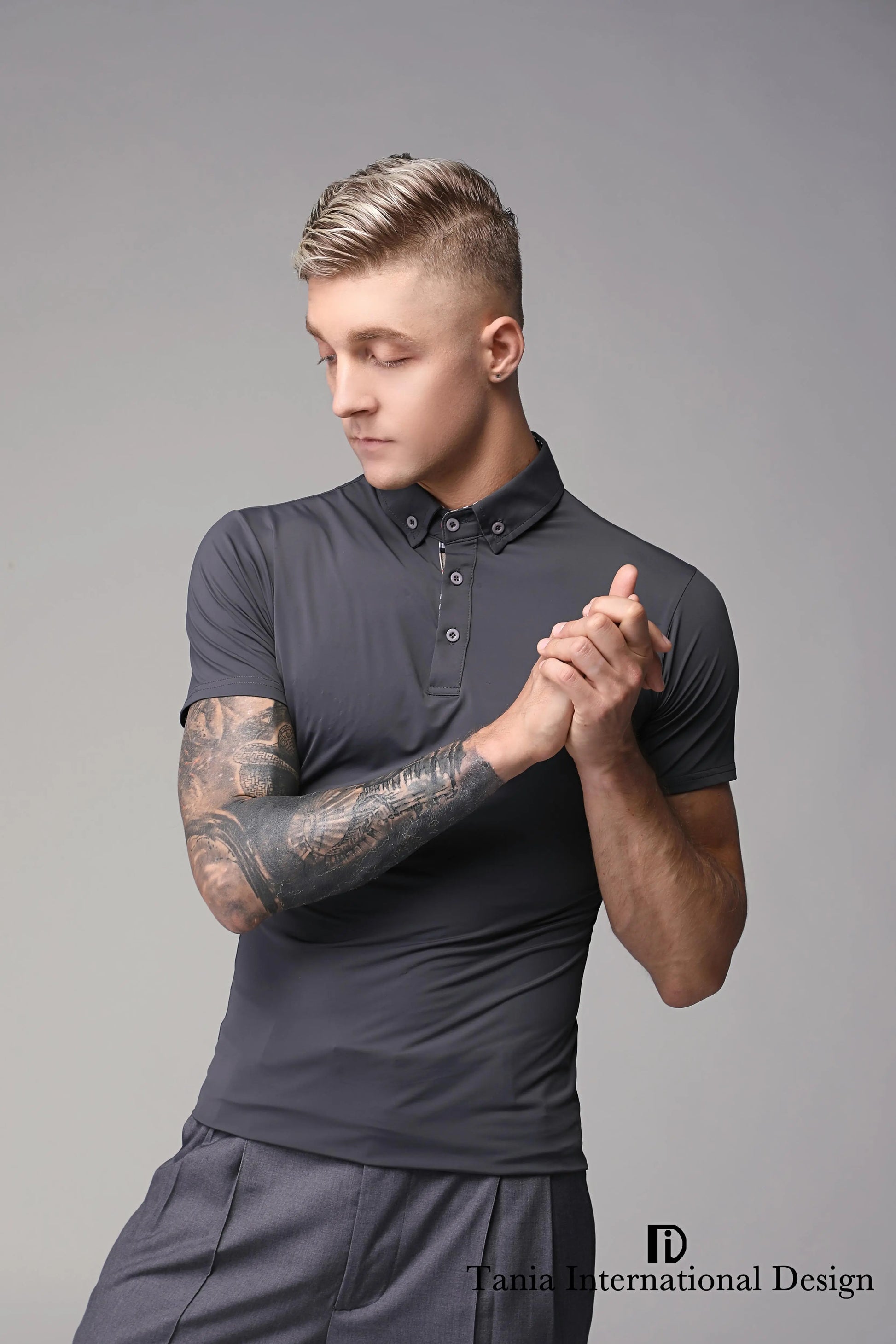 TID DANCE Dark gray polo shirt and pants on a gray background