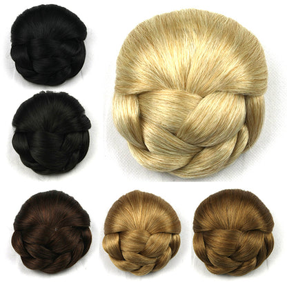 Collection of braided hair extensions in black, brown, and blonde on a white background